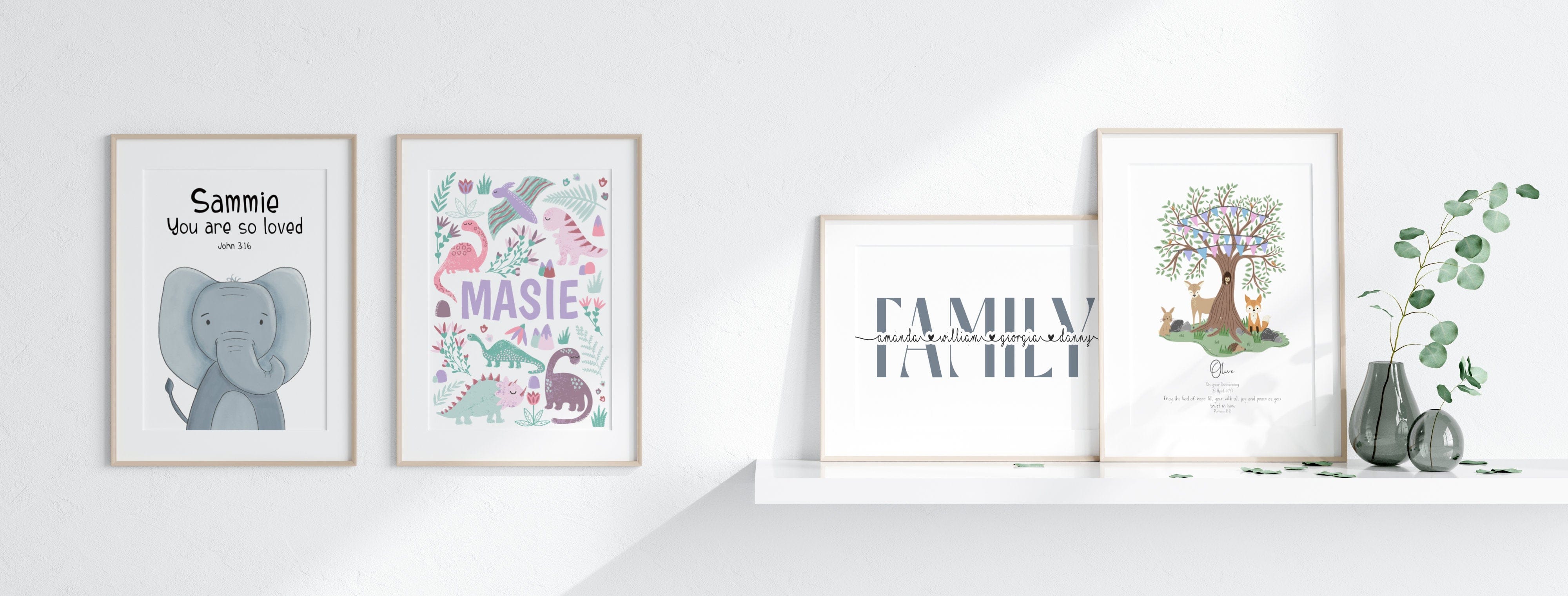 Four framed prints on a white wall with decorative elements.