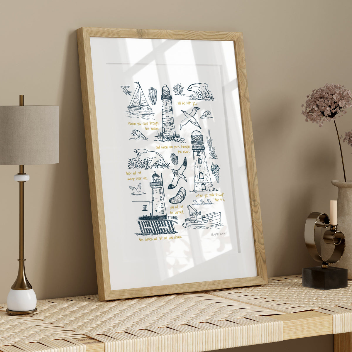 Lighthouse Bible verse print in a light wood frame styled on a neutral shelf with simple natural decor.