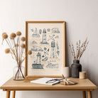Lighthouse Christian art print with Isaiah 43:2 scripture displayed above a wooden console table with soft neutral coastal styling.