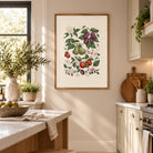Orchard fruit wall art displayed in a bright cottage-style kitchen with warm wood and soft neutral tones.