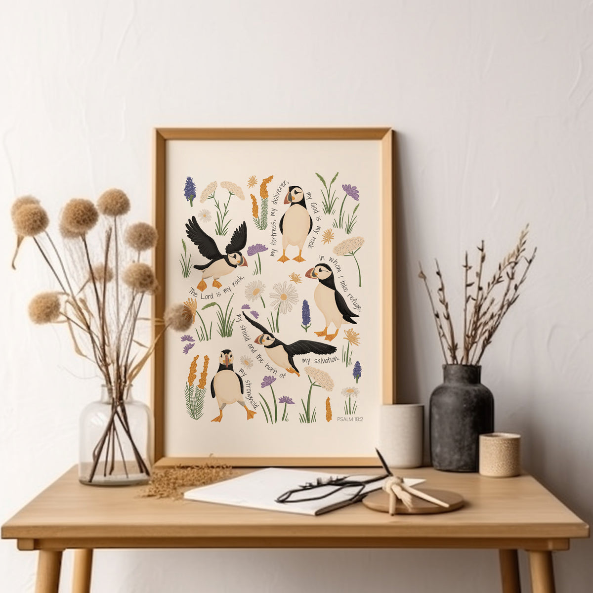 Close-up of hand-drawn puffin and sea holly Christian art print featuring Psalm 18 scripture and soft coastal colours.